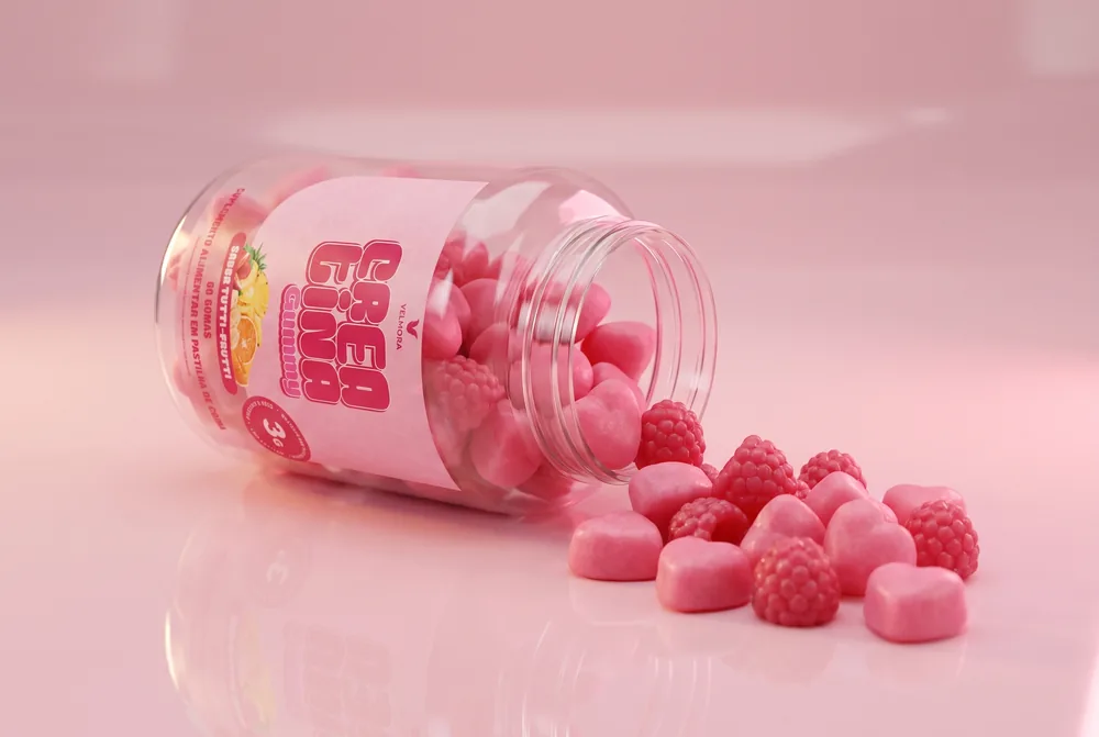 Pote de Crea Gummy aberto com as gomas saindo